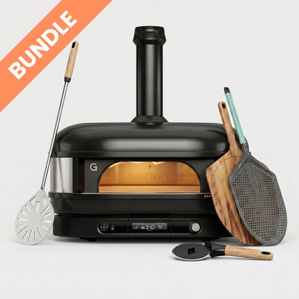 Gozney Dome Schwarz 2. Generation Pronto Starter Set Bundle – Pizzaofen Nahaufnahme liegend mit Pizzaschieber, Holzpeeler und Pizzaschneider