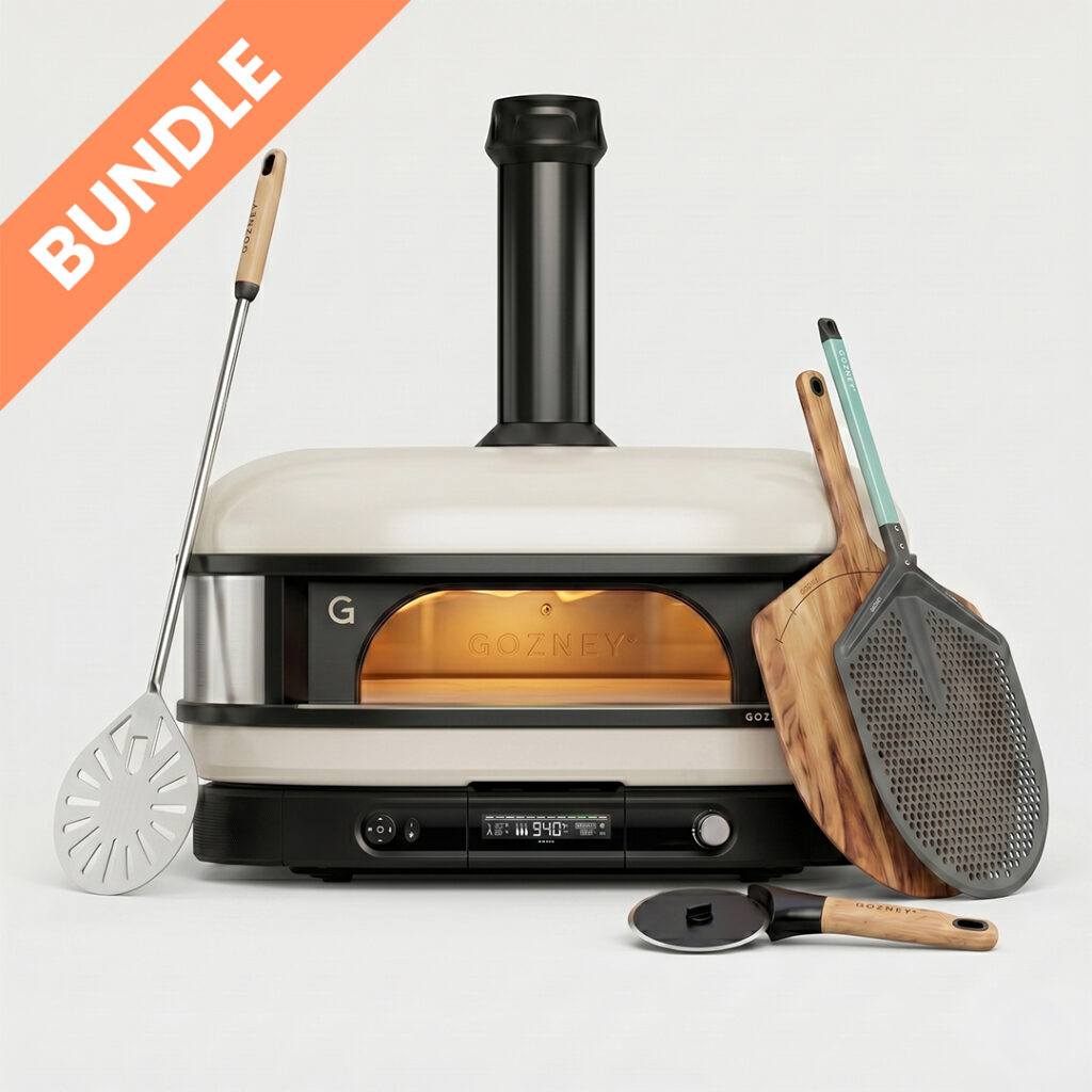 Gozney Dome Cremeweiß 2. Generation Pronto Starter Set Bundle – Pizzaofen Nahaufnahme liegend mit Pizzaschieber, Holzpeeler und Pizzaschneider
